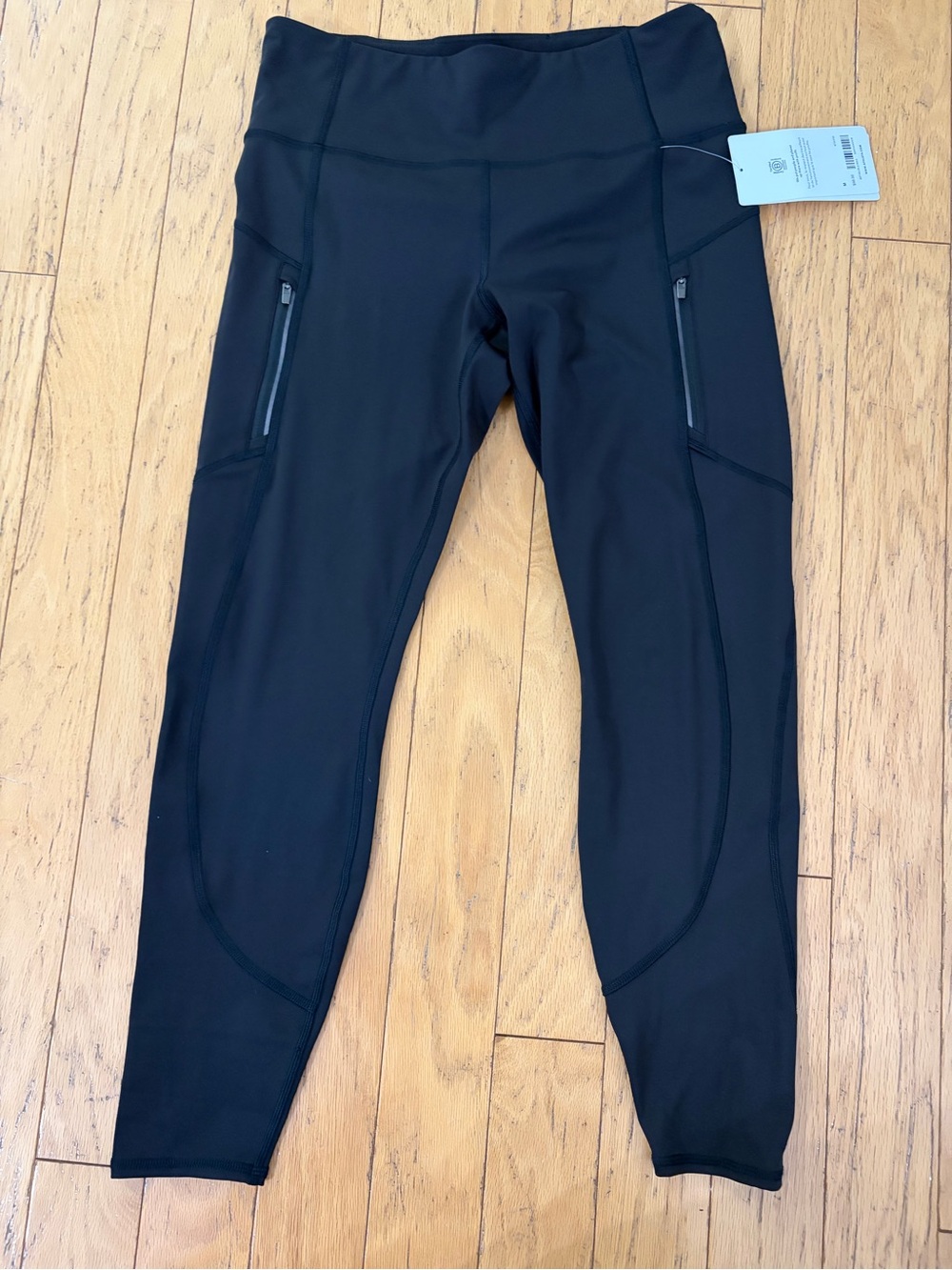 Athleta Black High-Rise Leggings with Zip Pockets